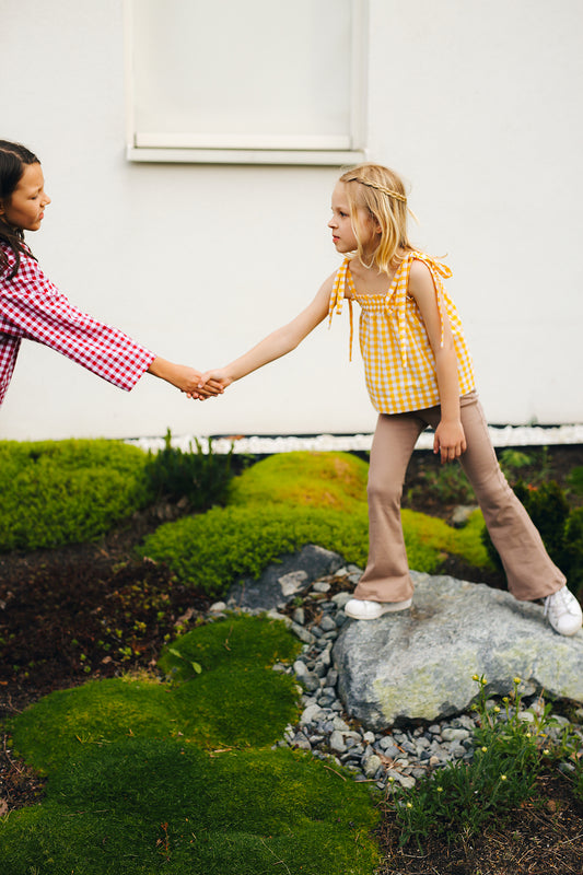 bluzka na wiązanych ramiączkach w biało-żółtą kratkę