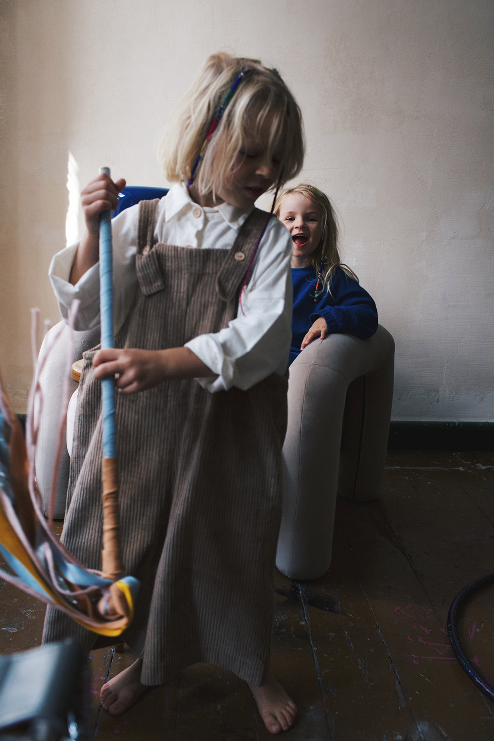 beige dungarees with wide legs- cloth took part in photo session