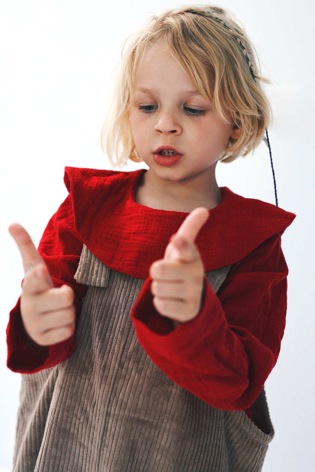 beige dungarees with wide legs- cloth took part in photo session