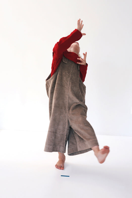 beige dungarees with wide legs- cloth took part in photo session