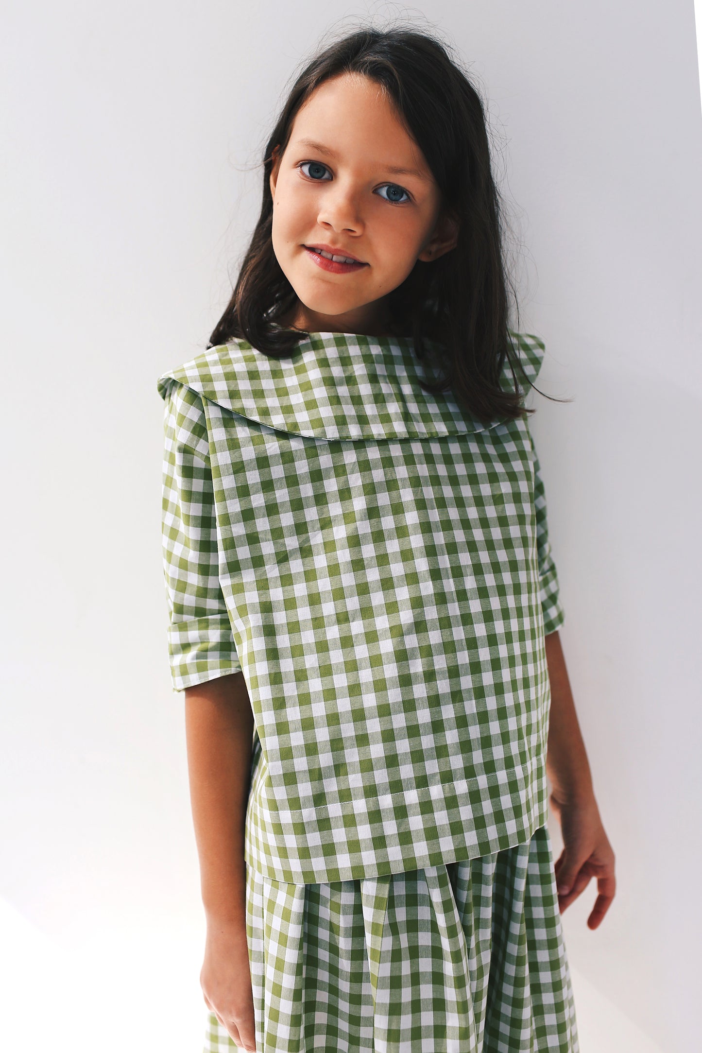 bluzeczka z dużym, okrągłym kołnierzem z krótkim rękawem w różowo-białą kratkę