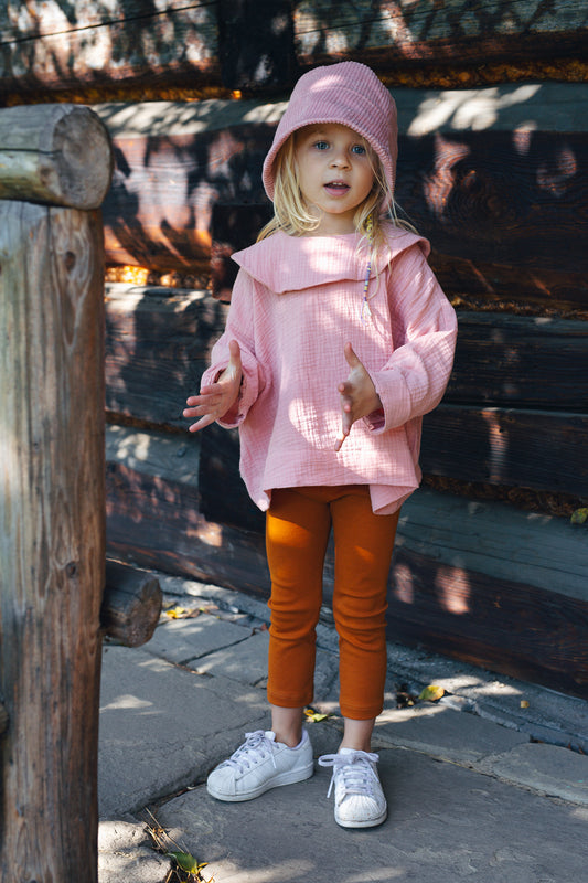 pink shirt with long sleeves with big round collar