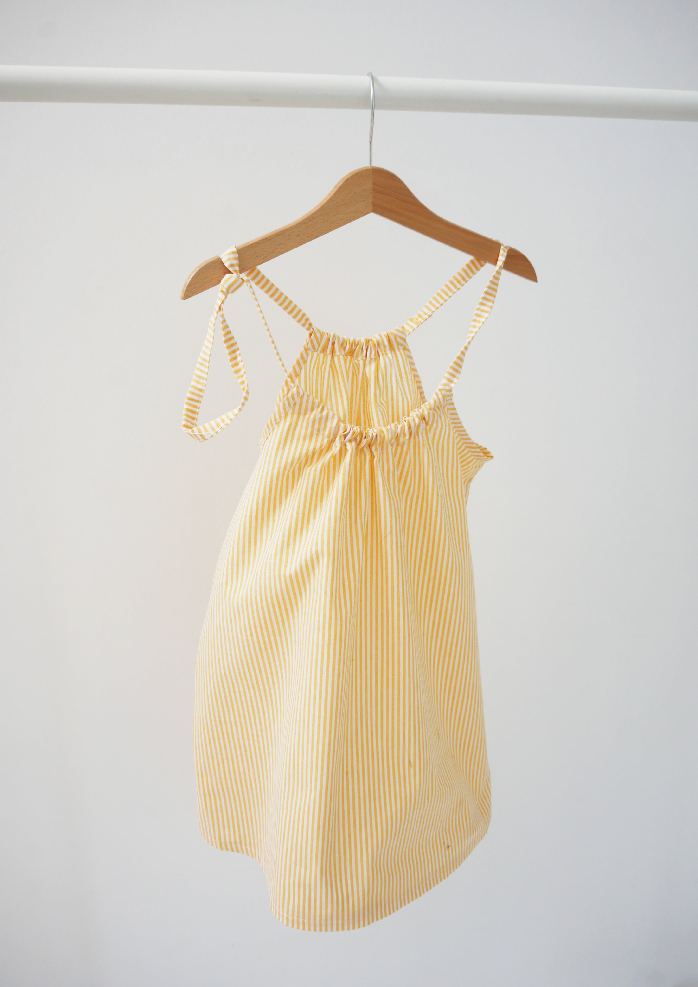 spódniczka/ sukienka na ramiączkach w żółto-białe paski