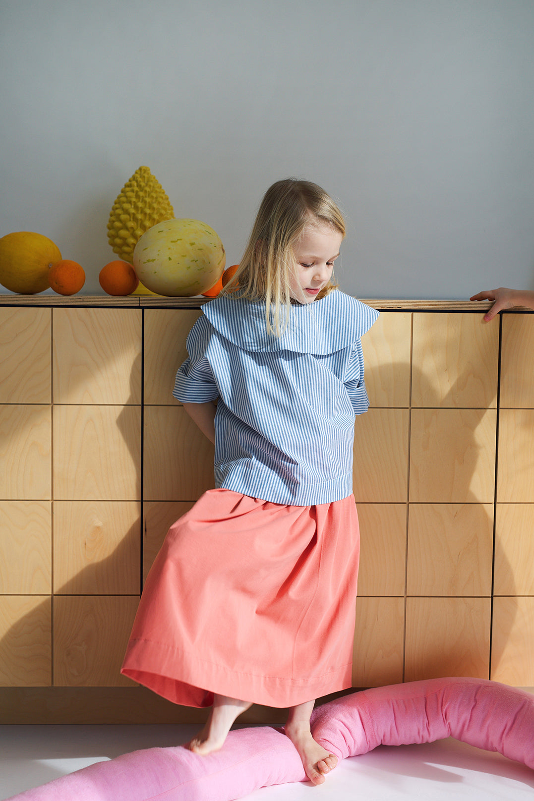 shirt with big, round collar with short sleeves with white and blue stripes