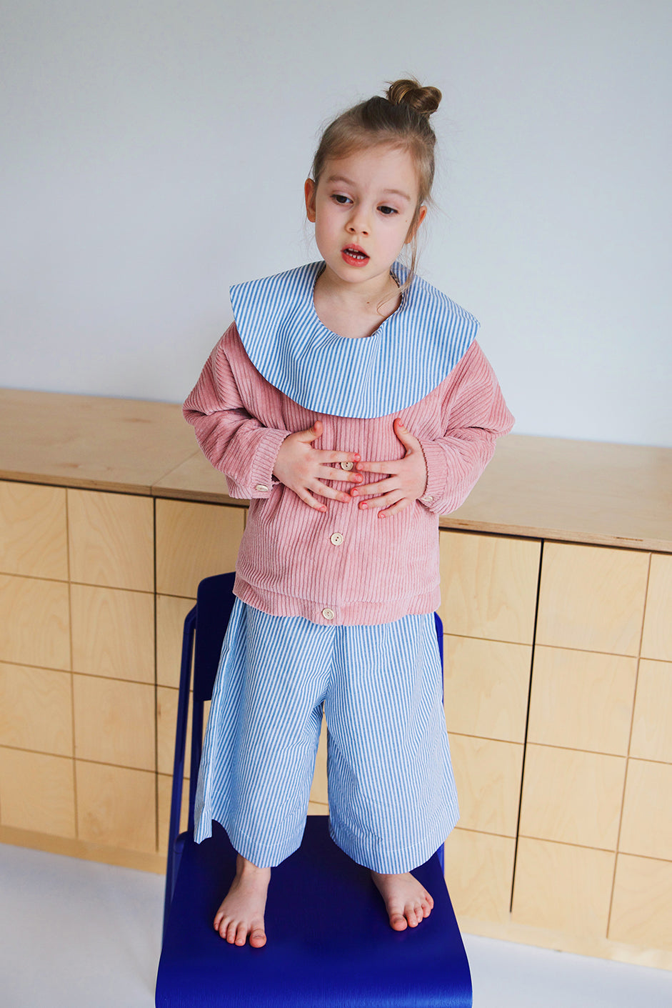 shirt with big, round collar with short sleeves with white and blue stripes