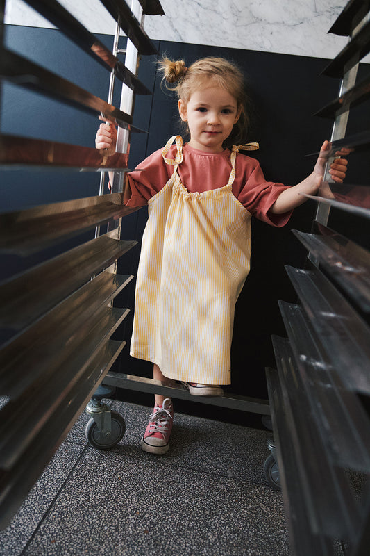 skirt/dress on adjustable straps with white and yellow stripes