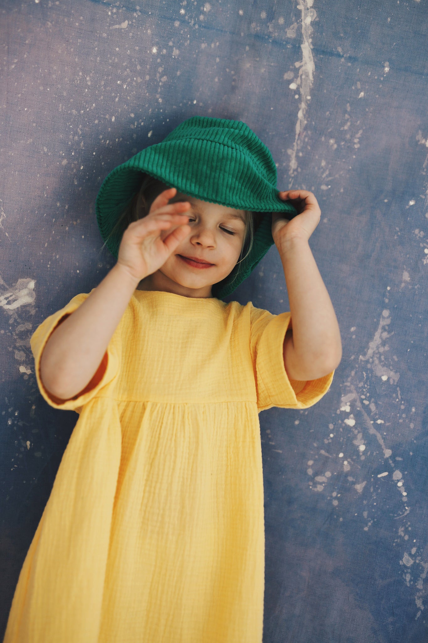 yellow dress with buttons on the back