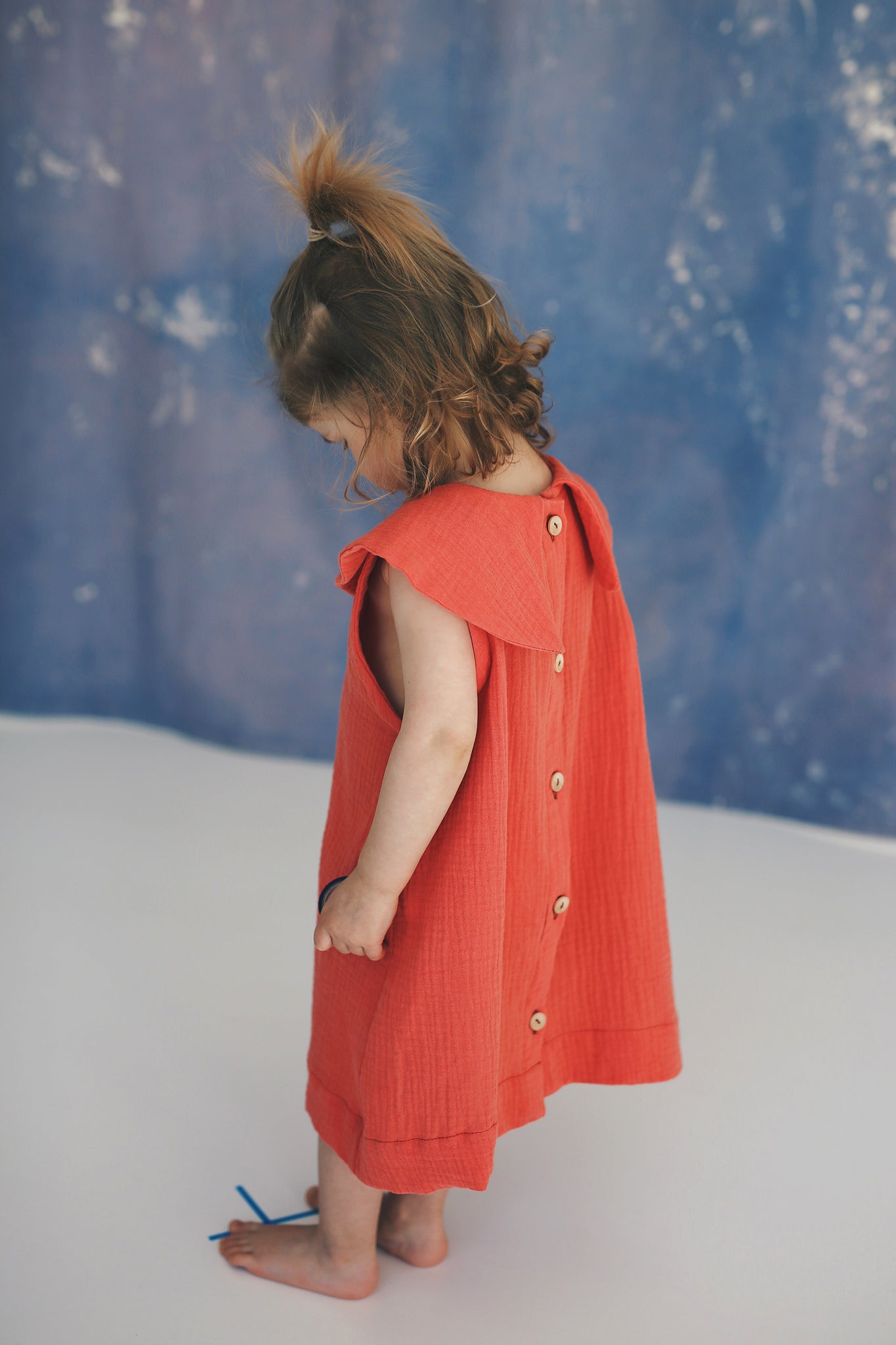 coral D=dress with big, round collar