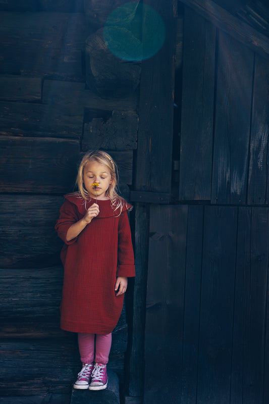 caramel dress with long sleeves with big, round collar