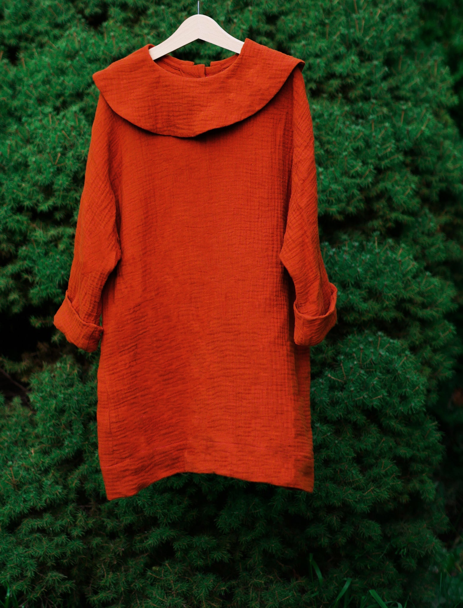 caramel dress with long sleeves with big, round collar